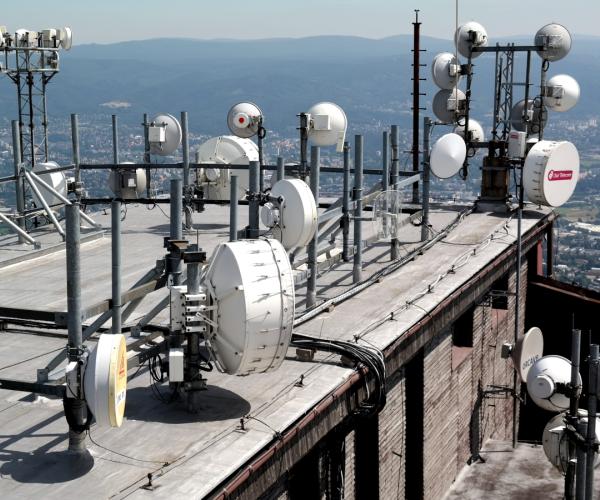 A roof with multiple receiver dishes